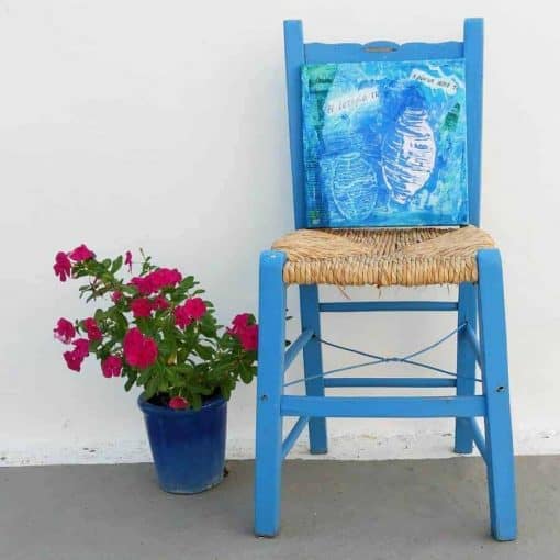 blue chair with flowers and blue canvas art of pots by Gill Tomlinson art