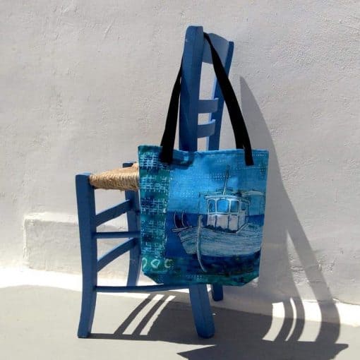 tote bag with artwork of greek fishing boat by gill tomlinson art