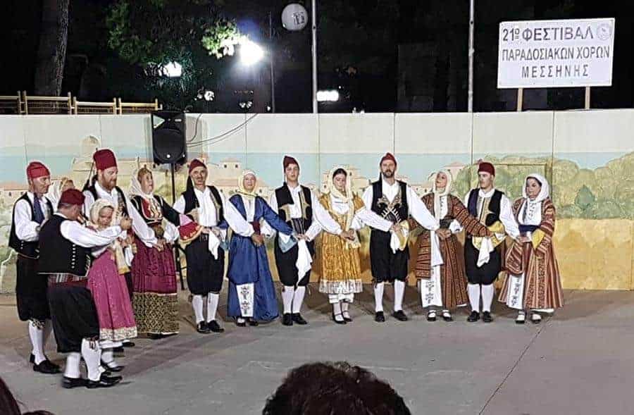 greek dancing roup in traditional costume